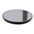 Black dual-temperature coffee mug warmer with low/high switch on a desk.