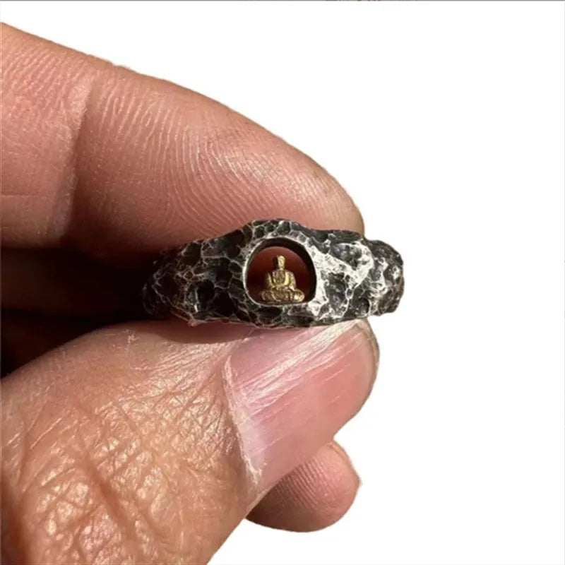 Hand-forged copper grotto Buddha ring with rock texture finish shown in size 8