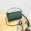 Genuine leather cylindrical crossbody phone bag in vegetable-tanned leather with single shoulder strap