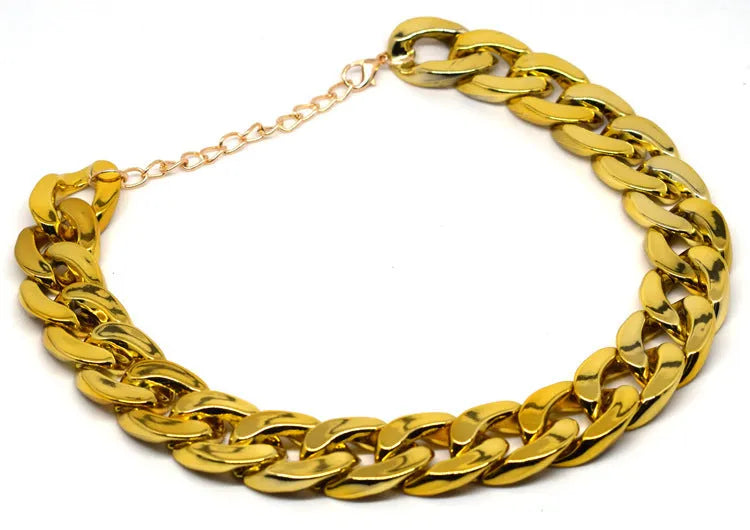 Geometric twisted chain dog collar with buckle on a white background, shown in a gold colour.