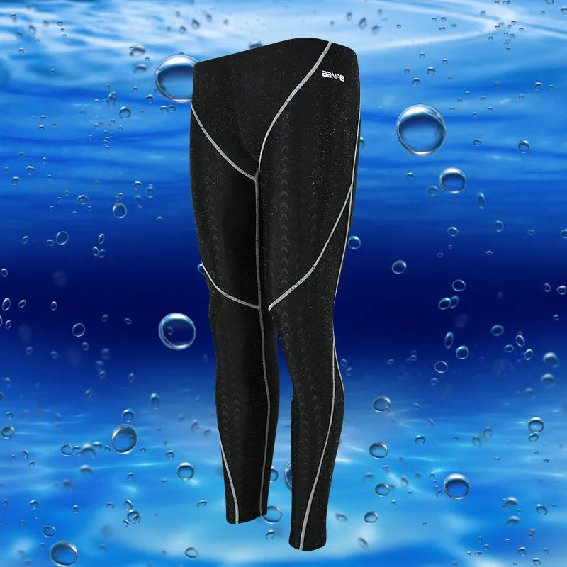 Men's black nylon cropped swimming trunks with a contrast line detail and drawstring waist.