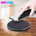 Black Qi wireless charging pad for iPhone 11 with USB cable