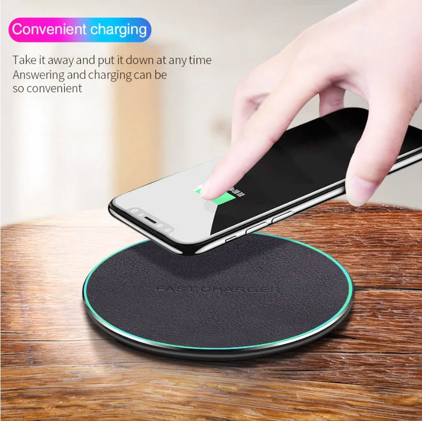 Black Qi wireless charging pad for iPhone 11 with USB cable