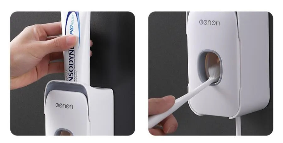 Blue automatic toothpaste dispenser mounted on a bathroom wall with a toothbrush below.