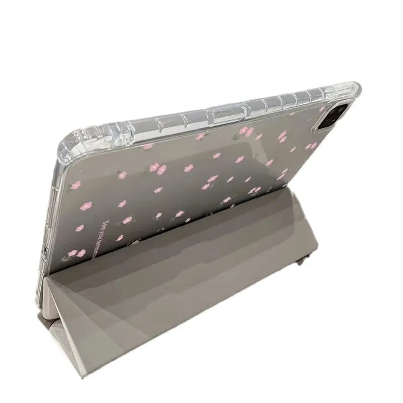 Transparent floral tri-fold iPad case with magnetic stand bracket shown open