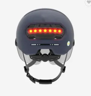 Cycling helmet with built-in rear LED brake light, shown in two sizes M and L