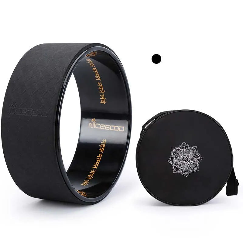 Pink pilates ring with TPE outer and ABS inner, 33cm diameter, on a light background