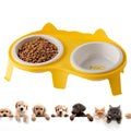 Ceramic cat food and water bowl set on tilted elevated stand in blue, pink, white or yellow colours