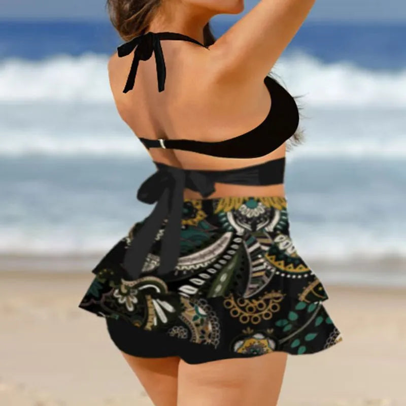 Women's purple high waist lace-up bikini swimsuit set with matching skirt on a white background.