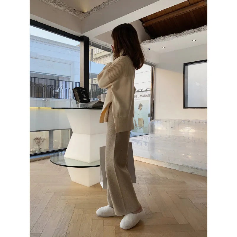 Women's high waist knitted wide-leg trousers in cream white colour with dropped mopping style