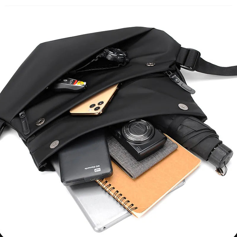 Grey PU leather crossbody sling backpack for men showing horizontal square shape and shoulder strap