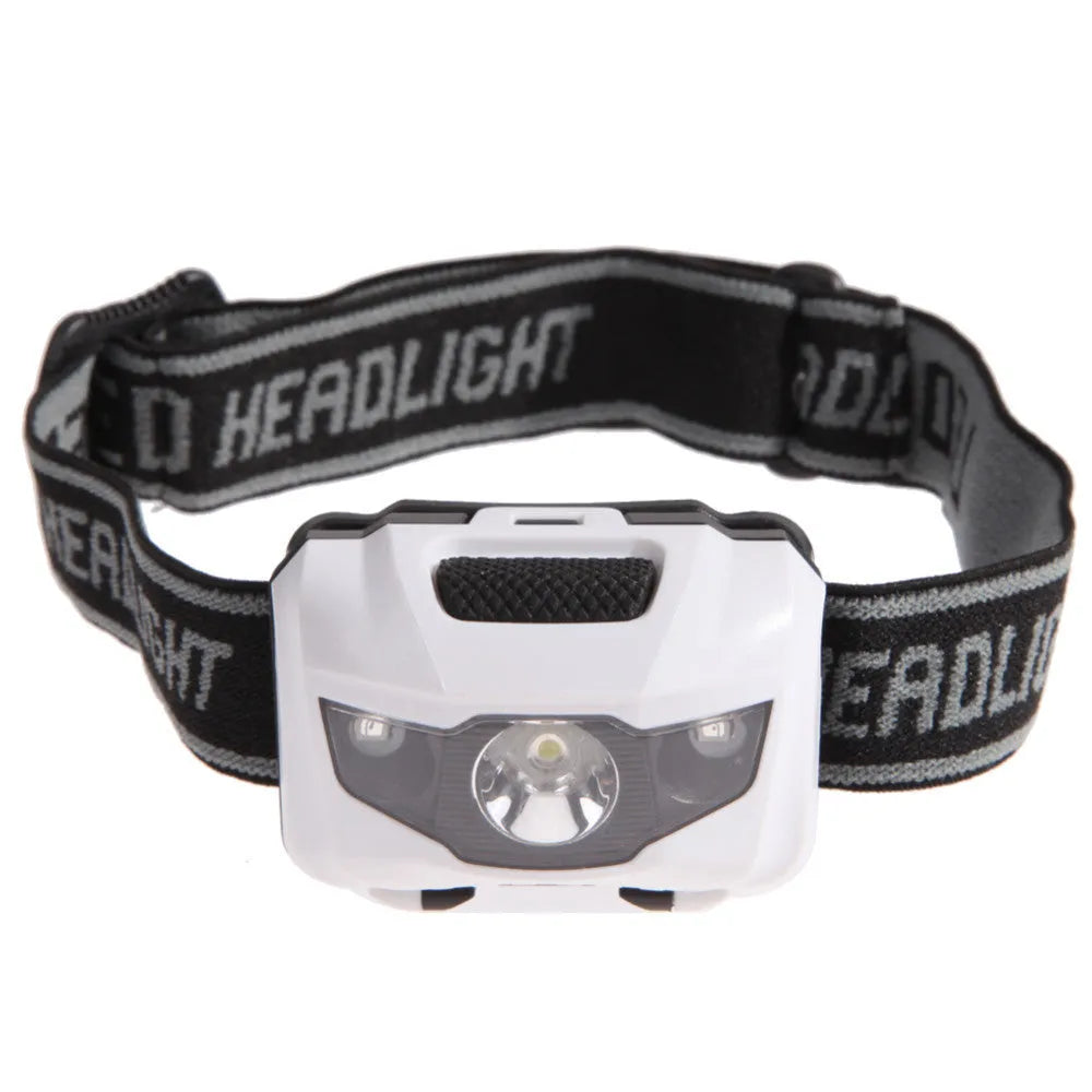 Black cat eye design LED headlamp head torch with white and red lights on an adjustable strap.
