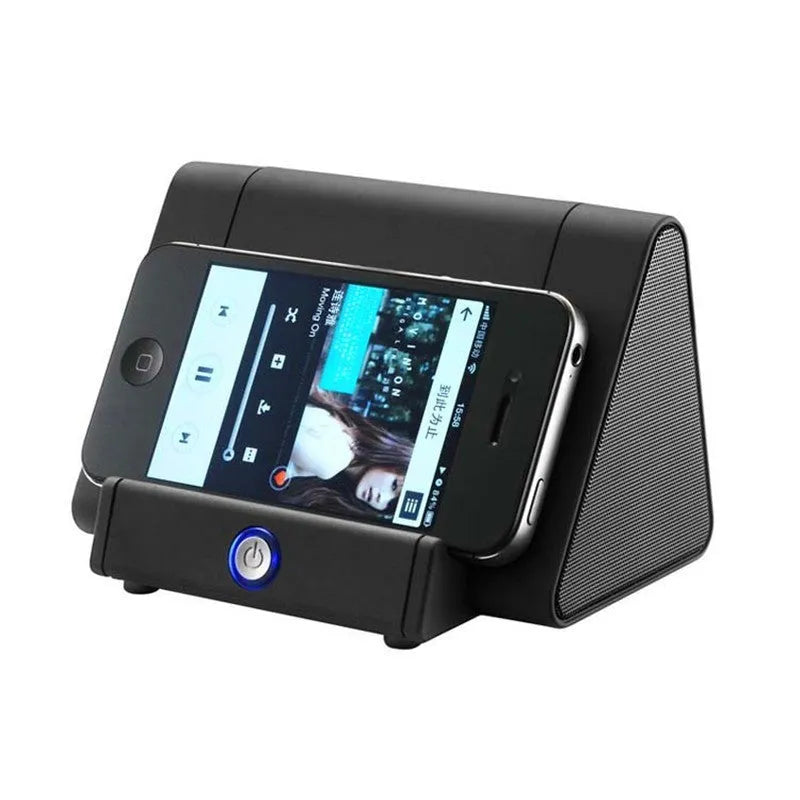 Black and white wireless mini Bluetooth speaker with charging cable