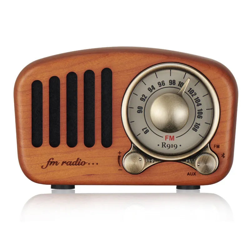 Retro style wooden mini wireless Bluetooth speaker in cherry wood or walnut finish.