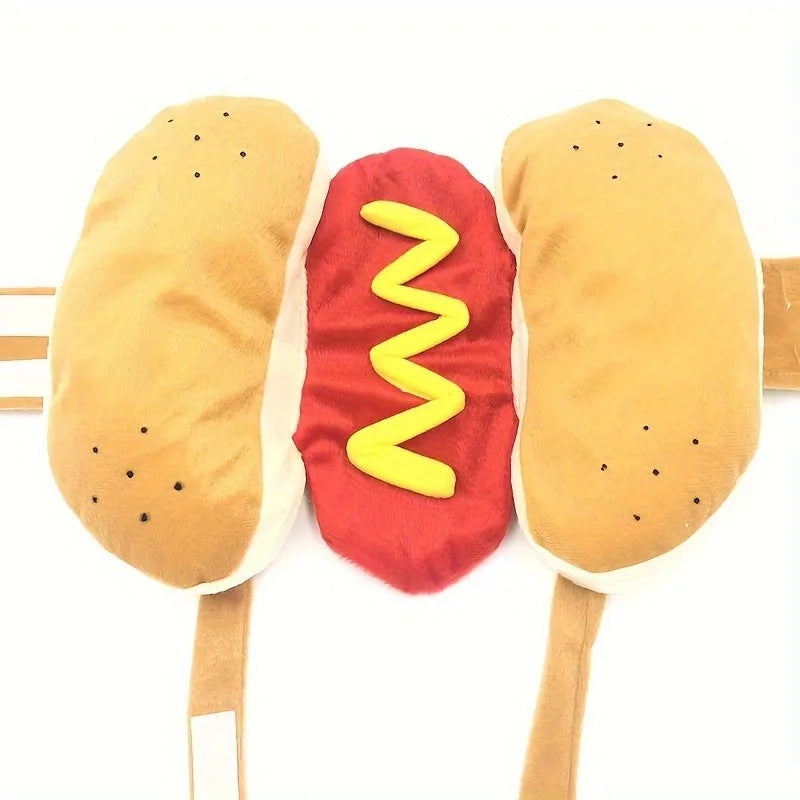 Small dog wearing a red and brown full-body hot dog costume with a bun-shaped hood.