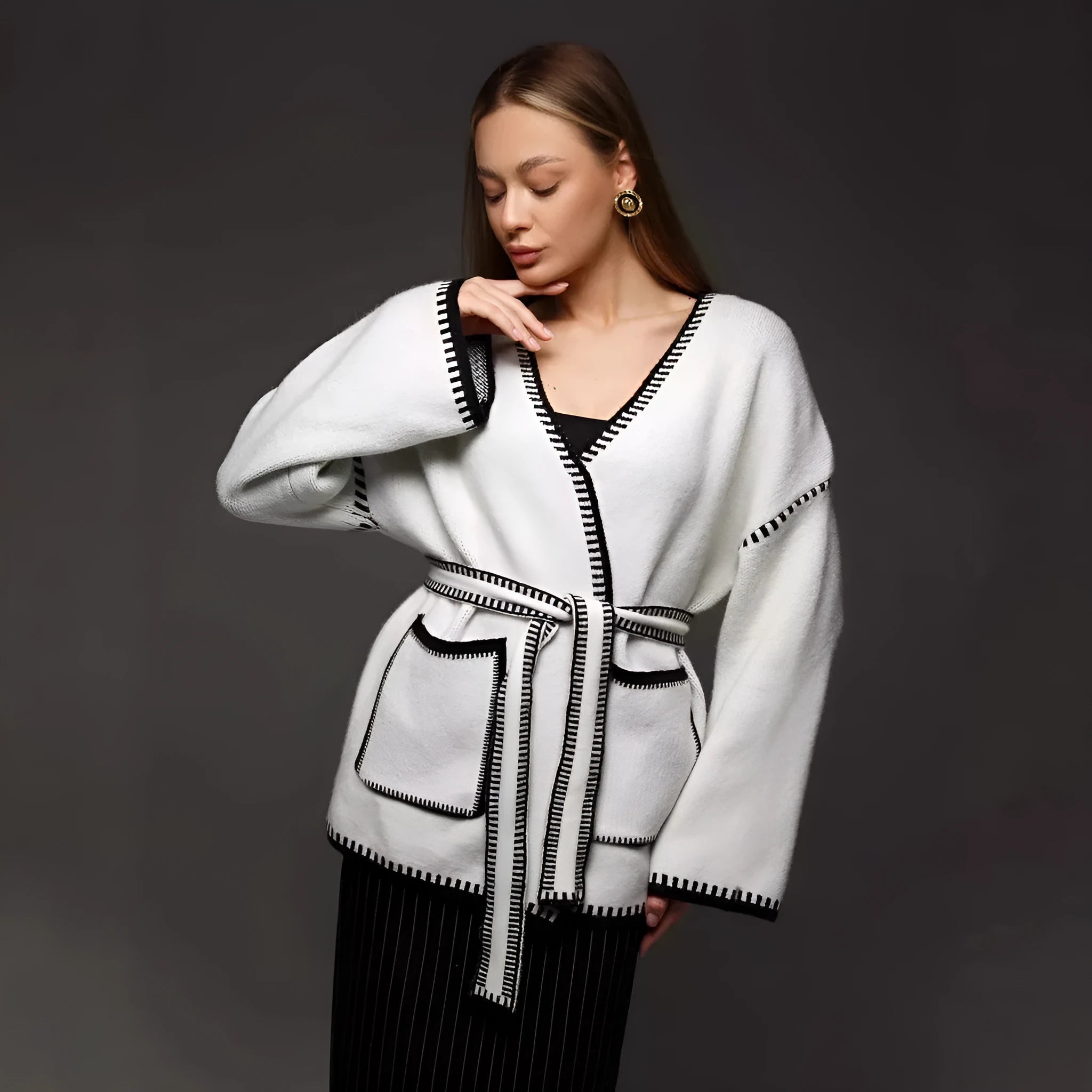 Lace-up front knitted cardigan in black camel or white colours with loose fit and long sleeves