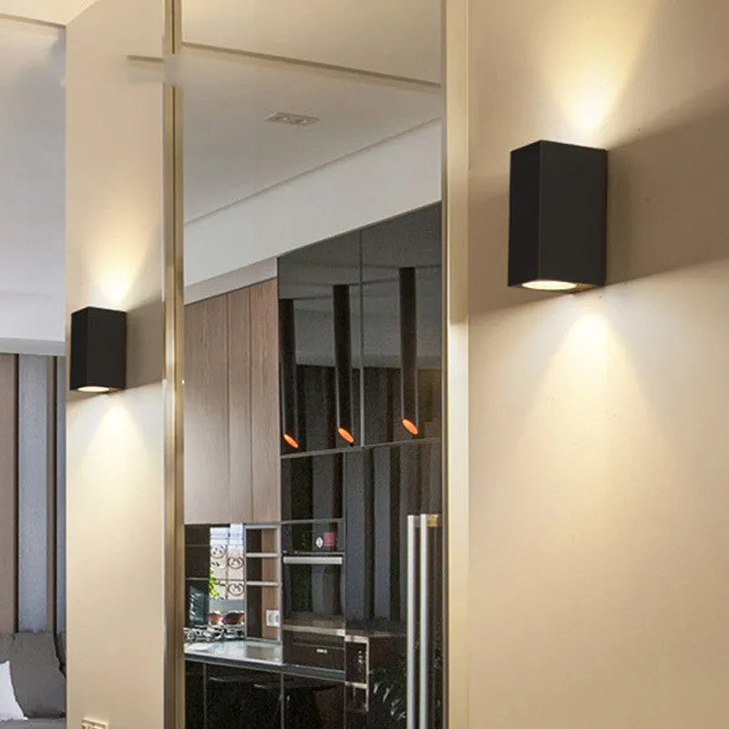Black aluminium wall lamp with frosted glass shade and LED light source