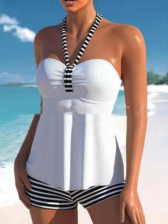 Women's solid colour black and white striped off-shoulder swimsuit in briefs style.