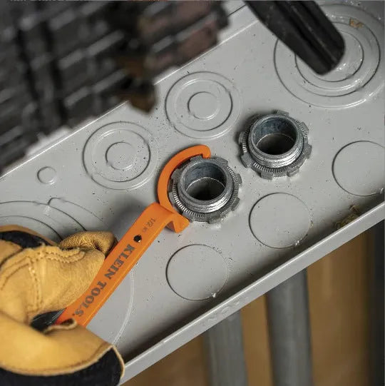 Three magnetic suction wrenches in orange, grey, and black colours with a crescent design.