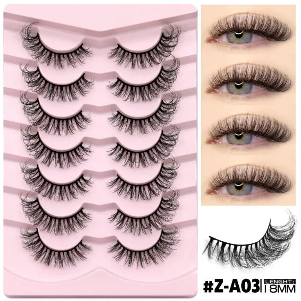 Box of artificial fibre false eyelashes in six styles with a tube of adhesive glue.