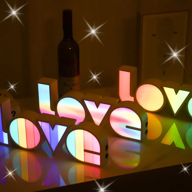 Rainbow style LED LOVE decorative light on a tabletop