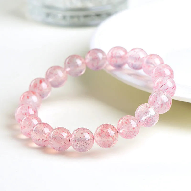 Strawberry quartz crystal bracelet with geometric beads in natural white water colour