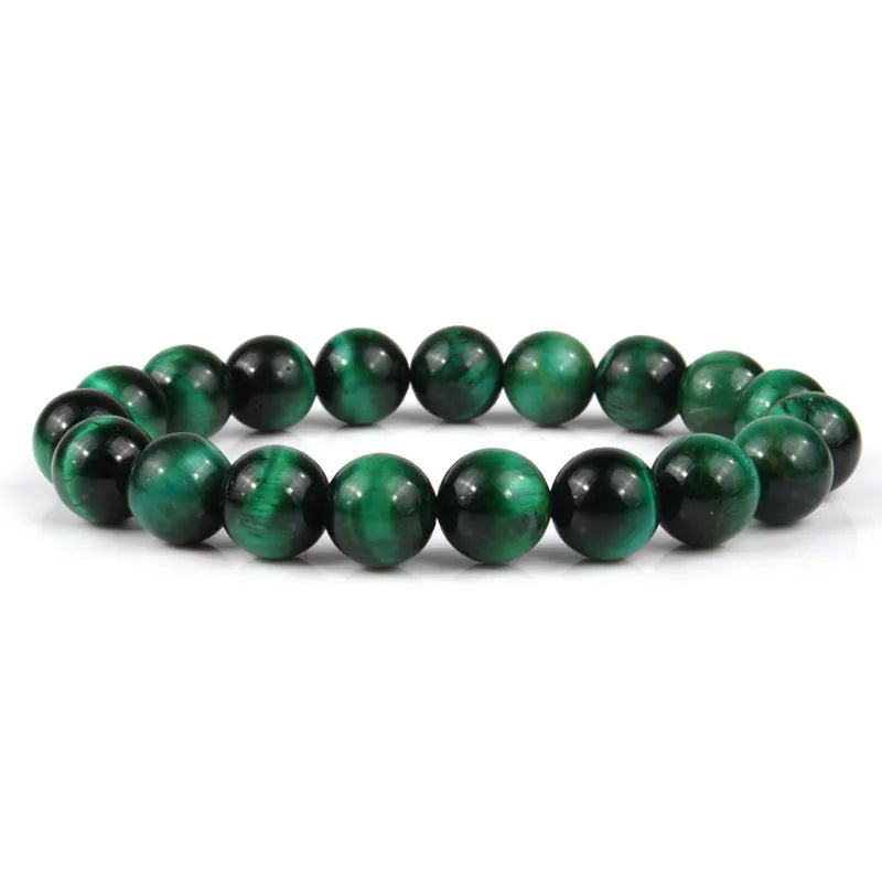 Natural tiger eye crystal bracelet with round beads in choice of colour and 6mm, 8mm, 10mm, or 12mm sizes.