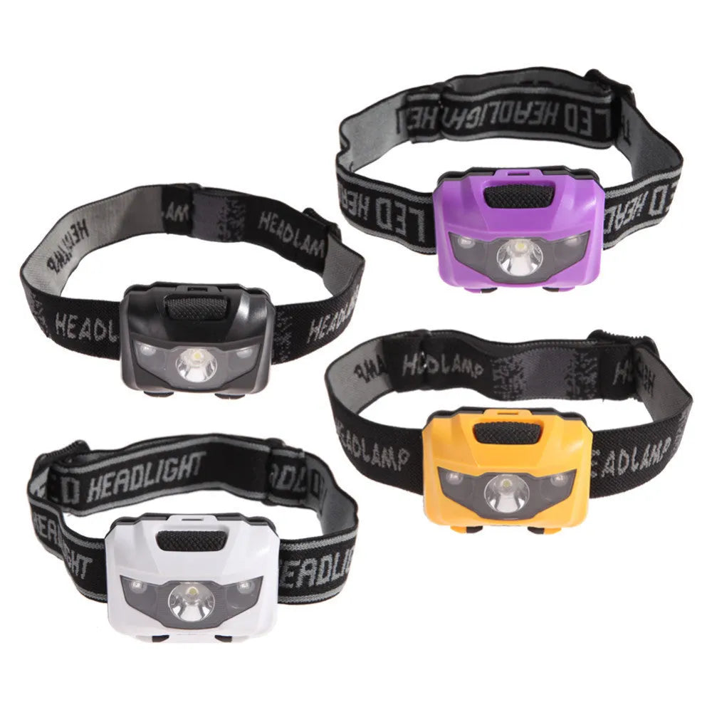 Black cat eye design LED headlamp head torch with white and red lights on an adjustable strap.