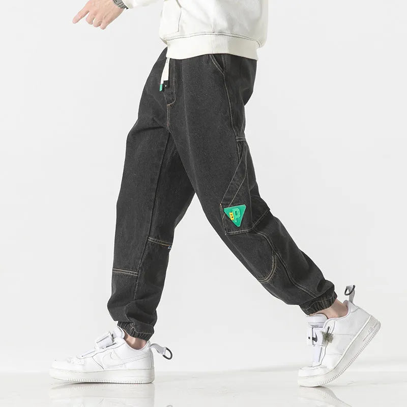 Men's cotton loose-fit tapered trousers in black, blue, and grey colours