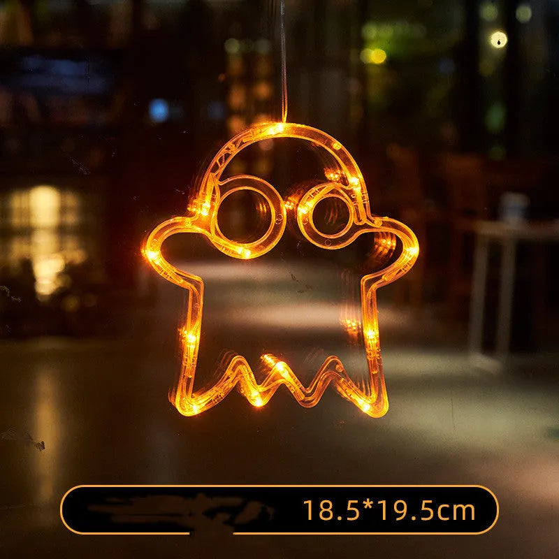 Halloween window hanging LED lights with spider, pumpkin and ghost designs on suction cups