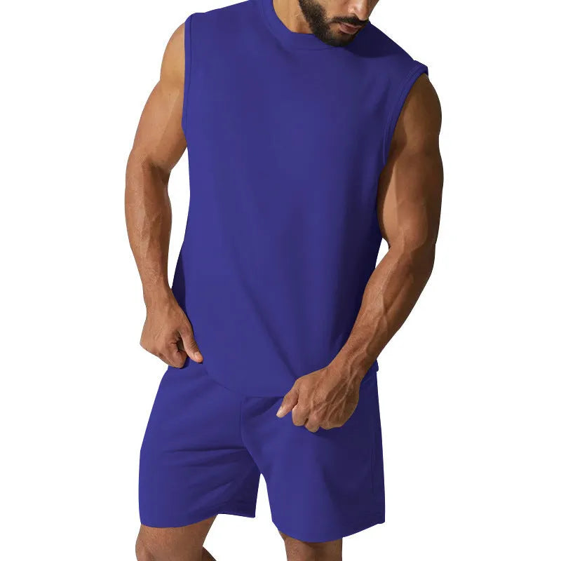 Men's sleeveless cotton blend sports top and matching shorts in a solid colour on a hanger.