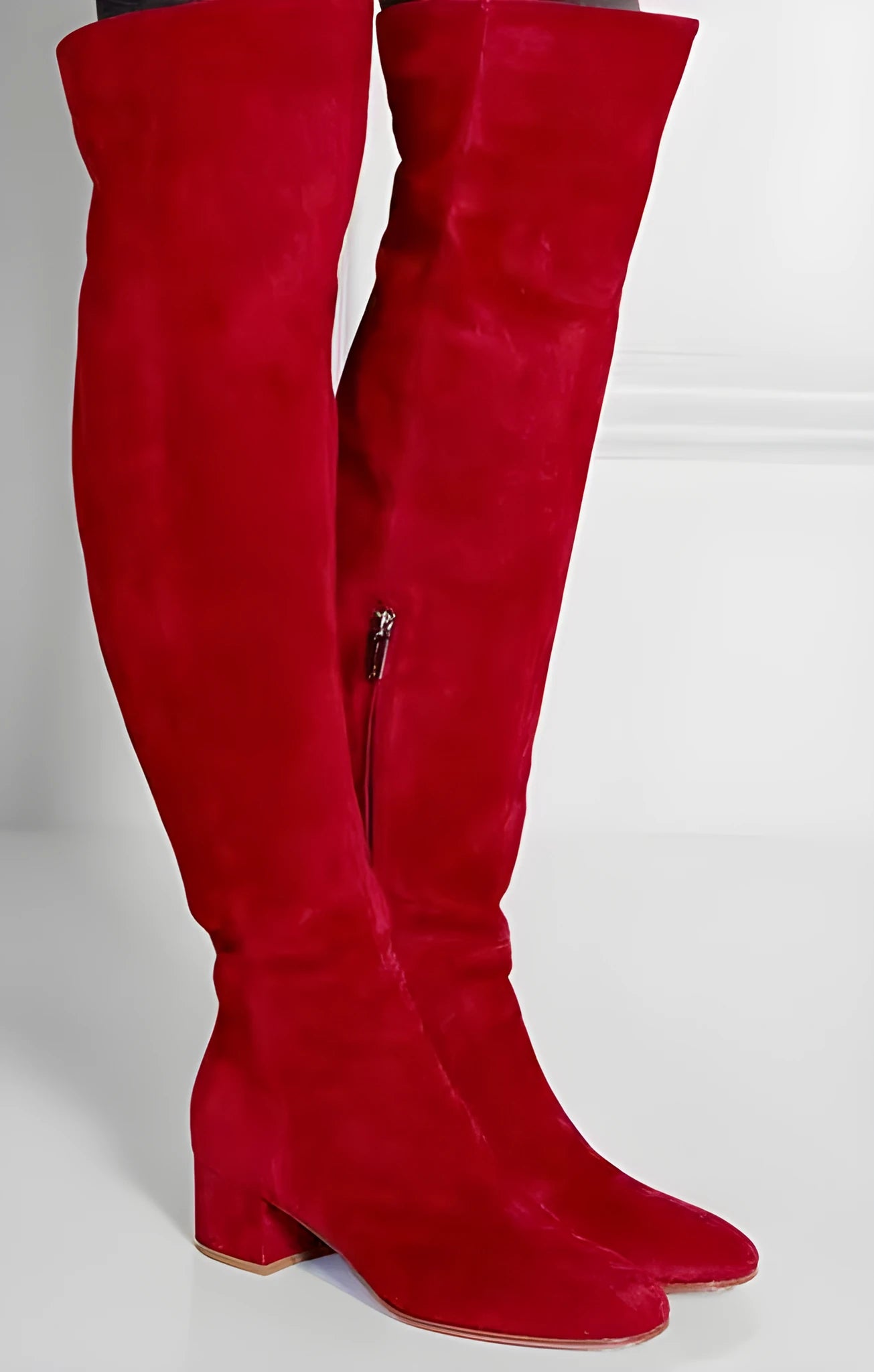 Grey women's flat over the knee suede boots with a pointed toe and low thick heel.
