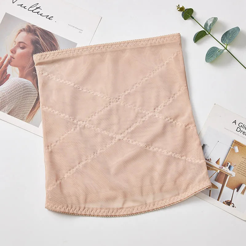 Black mesh belly band body sculpting strap for post-partum waist trimming on a mannequin.