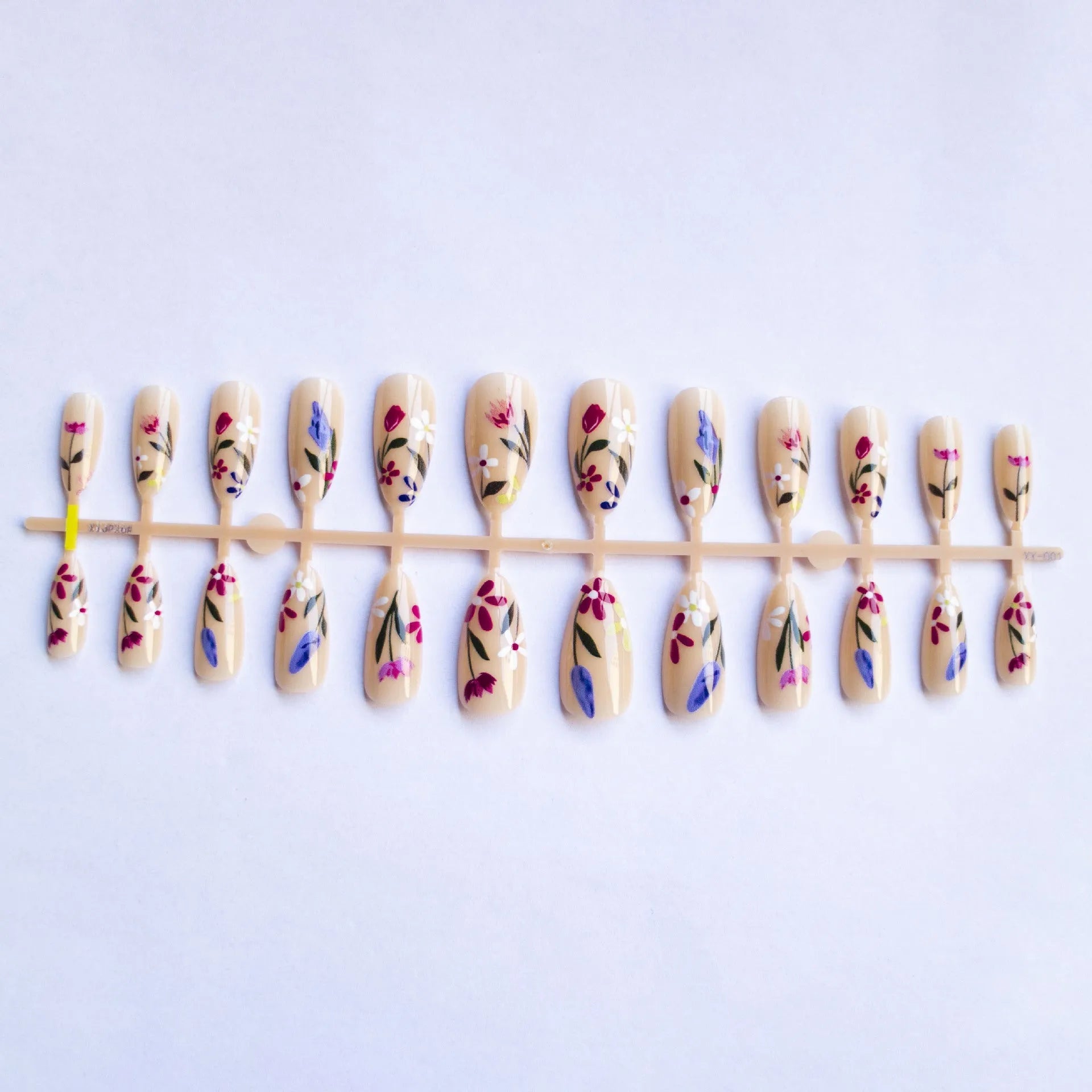 Almond-shaped press-on nails with European floral wear armour rose tulip patterns