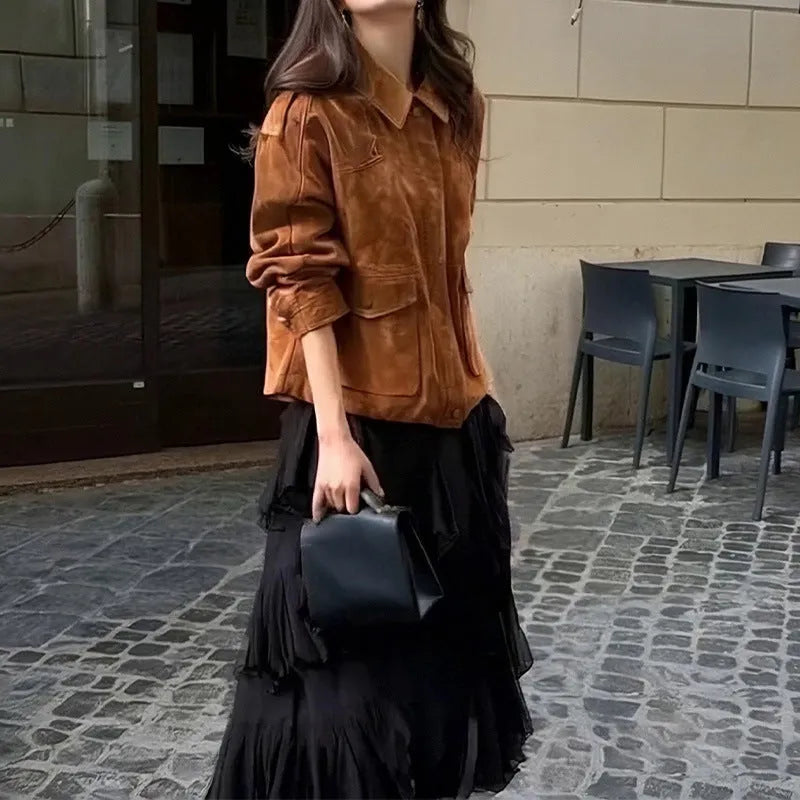 Women's brown polyester suede coat with regular sleeves on a hanger.
