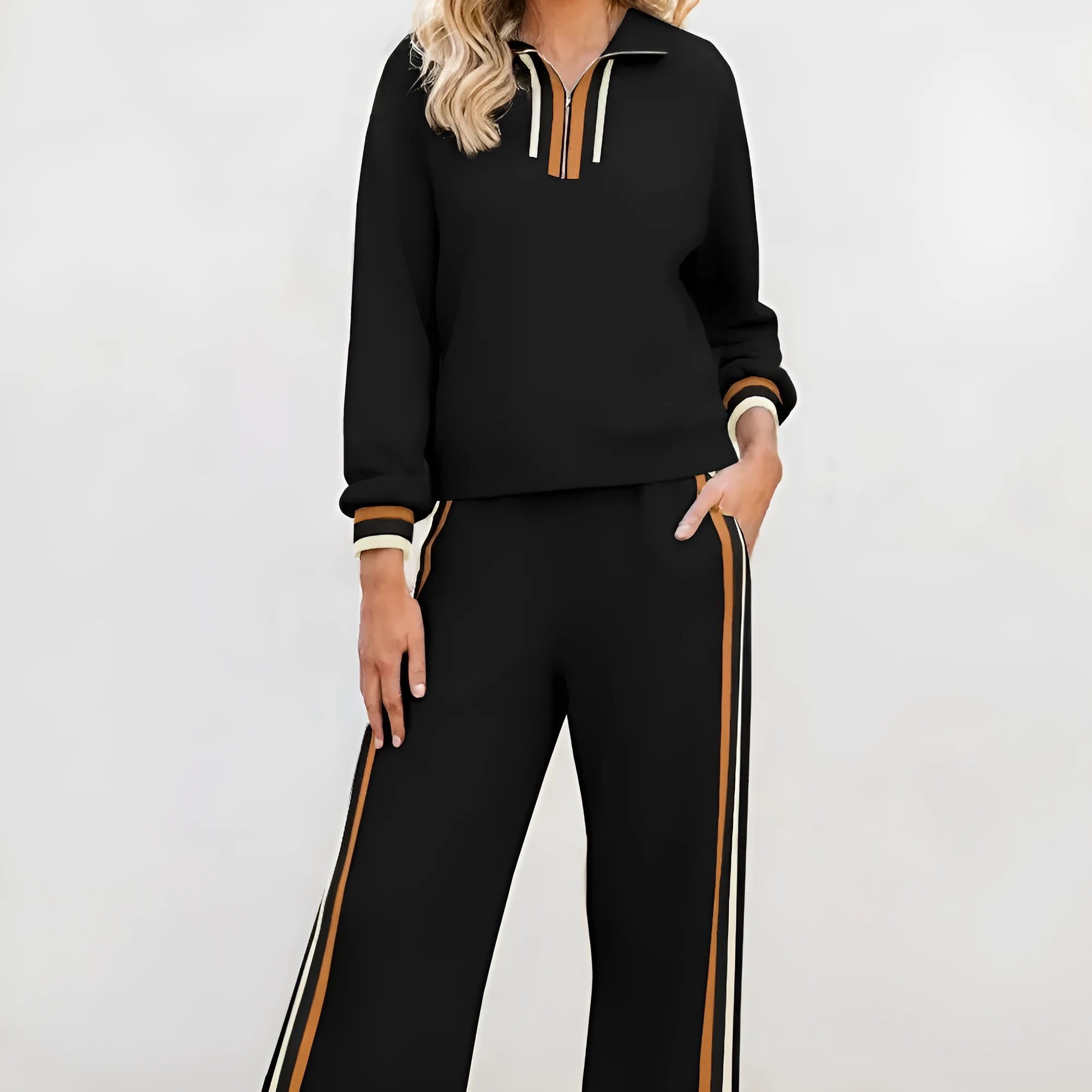Black striped patchwork quarter zip pullover and loose trousers loungewear set on model