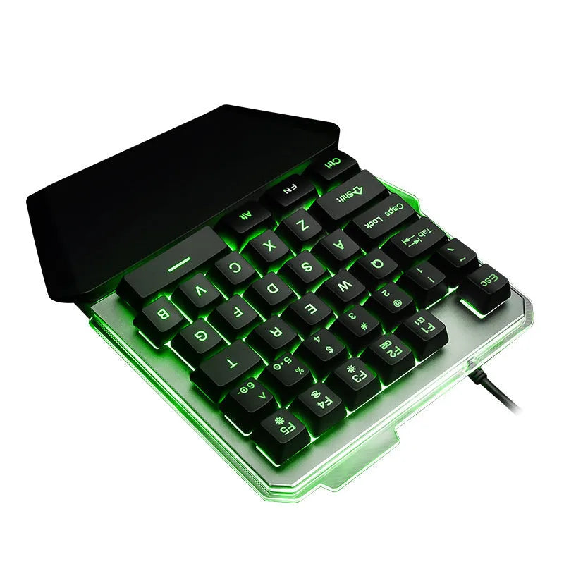 Black robotic one-handed gaming keyboard with RGB backlighting and USB cable