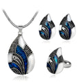 Water drop jewelry set including necklace, earrings and ring in gold or silver zinc alloy finish.