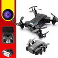 Quadcopter drone with HD 2 million pixel camera, black colour, propellers, and VR glasses on a white background