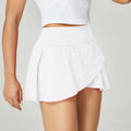 Women's solid colour quick-dry nylon sports shorts with spandex lining, shown in multiple colour options.