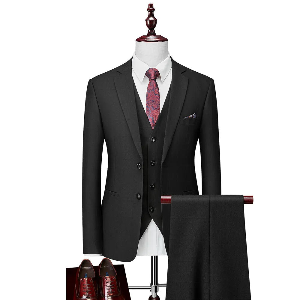 Men's navy blue plaid slim fit three-piece suit with vest, jacket, and trousers on a hanger.