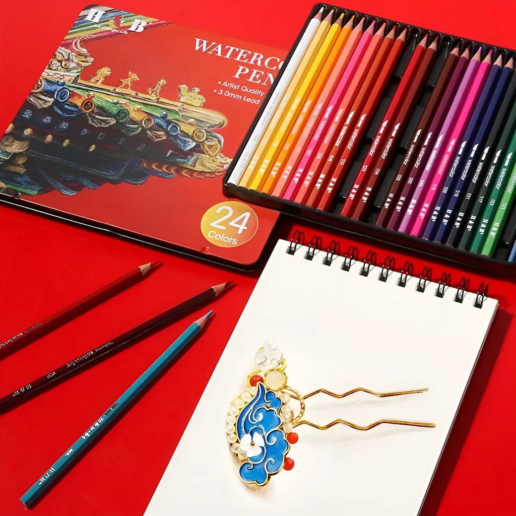 24 water-soluble coloured pencils in metal tin box measuring 21cm by 18cm