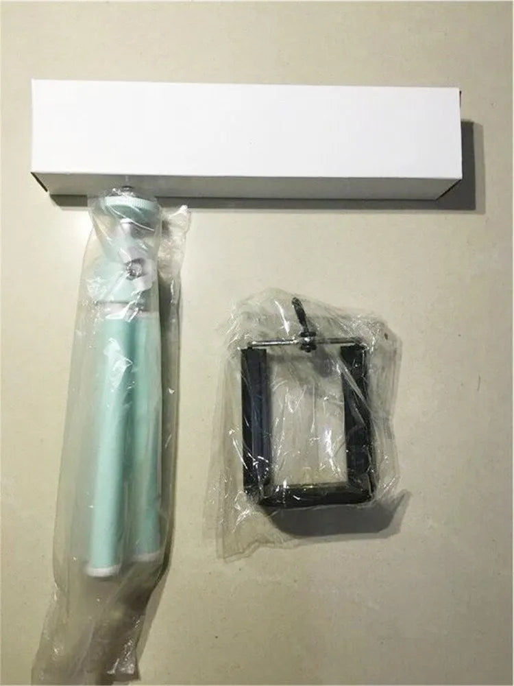 Two-section adjustable desktop phone holder in black and silver colour options on a desk