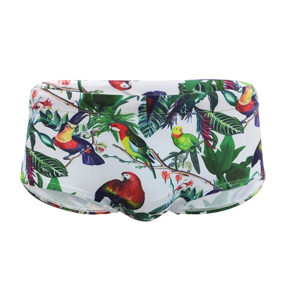 Men's floral bird print swimming trunks in nylon fabric, shown in small boxer style.