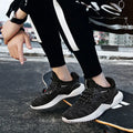 Men's low-top running shoes in multiple colours with mesh upper and front strap.