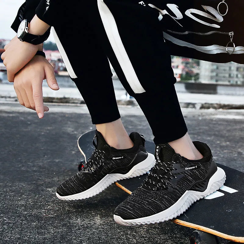 Men's low-top running shoes in multiple colours with mesh upper and front strap.