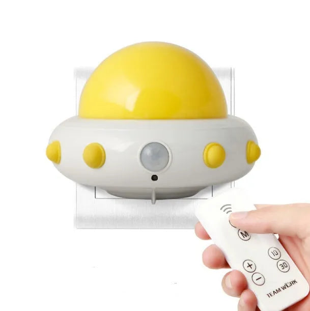 Remote control UFO shaped bedside night light in white, blue or pink colours