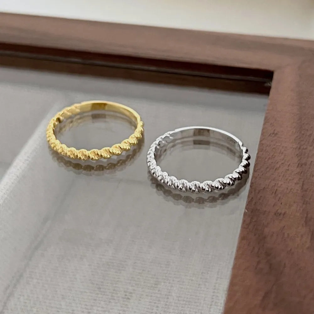 S925 sterling silver geometric twist ring with hexagon and octagon design, white gold colour, side view
