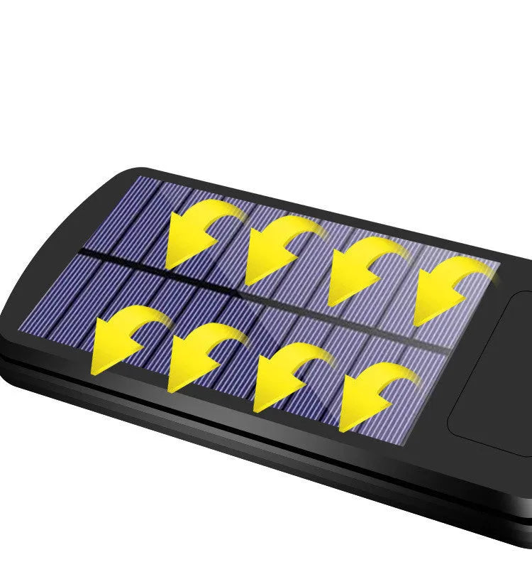Black solar-powered outdoor wall light with motion sensor for garden and driveway security.