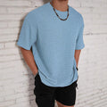 Men's slim-fit solid colour t-shirt in light blue with round neck and short sleeves